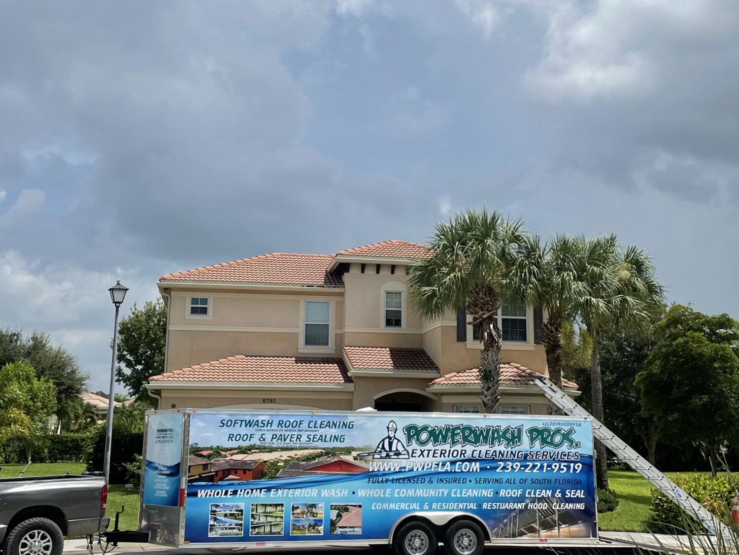 The same two-story home after exterior cleaning