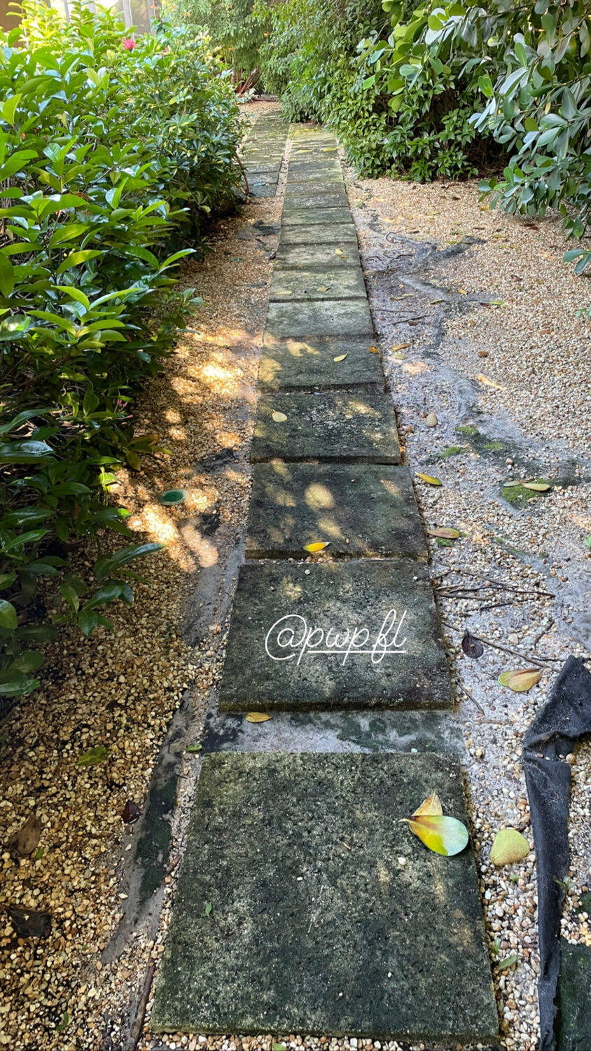 A paver walkway cleaned with controlled pressure